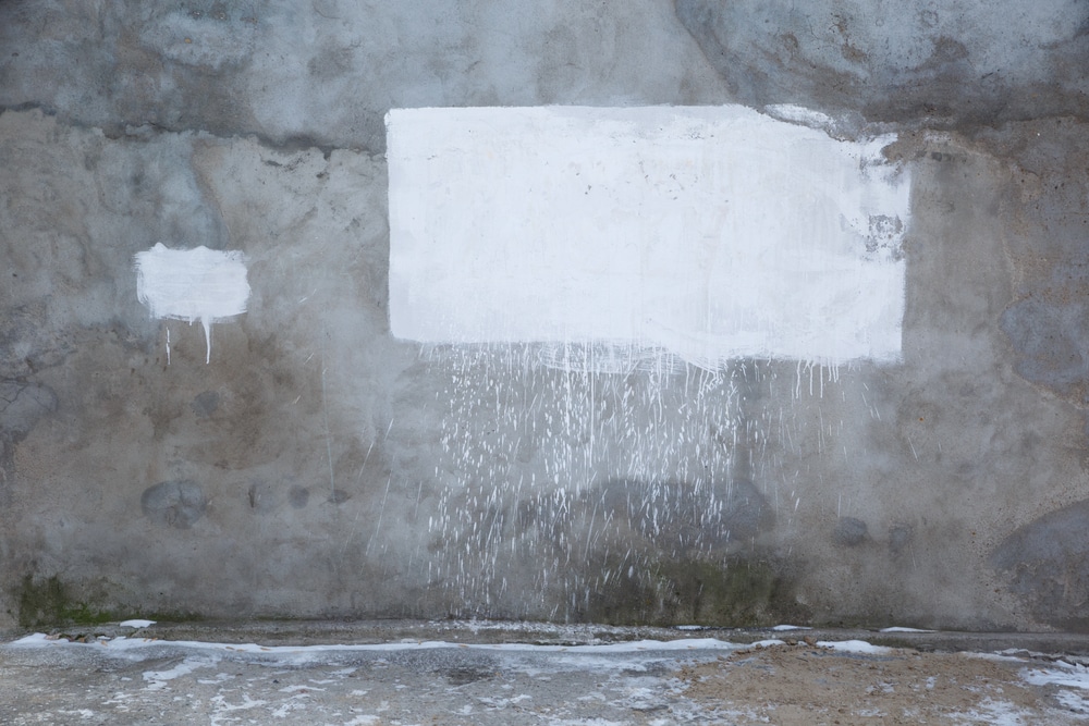 Graffiti Verwijderen Gevel tijdens het verwijderen van graffiti